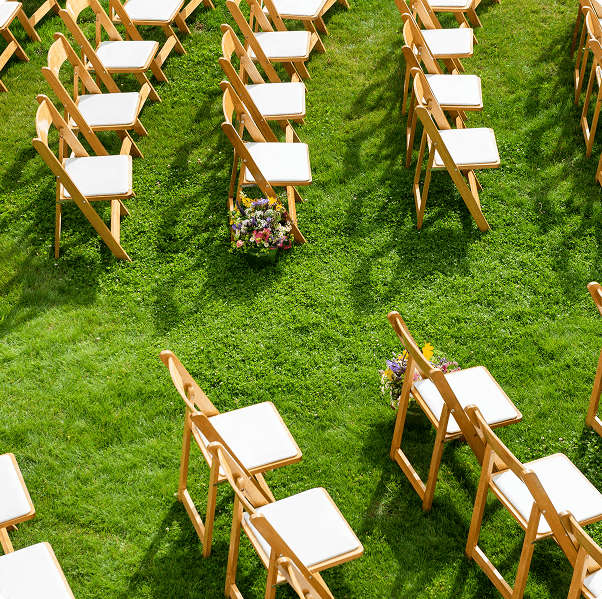 rows of empty seats at a wedding